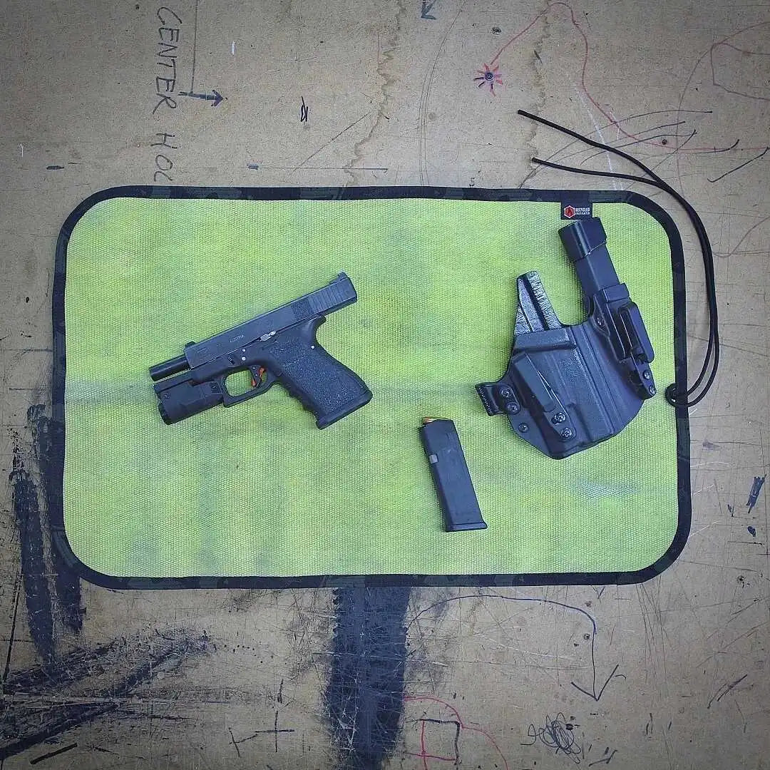 Drop Zone Mat - Premium - Firehose EditionDrop Zone Mat — Premium (Cordura-Backed Fire Hose)
USA-Made Repurposed Fire Hose Work Mat
Built for the garage, the range, the trail — and everything in between.
Th