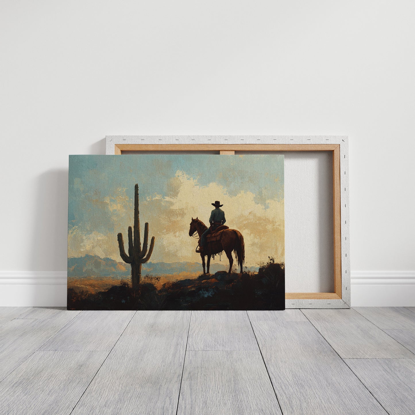 Cowboy-Sonnenuntergang bei den Saguaros