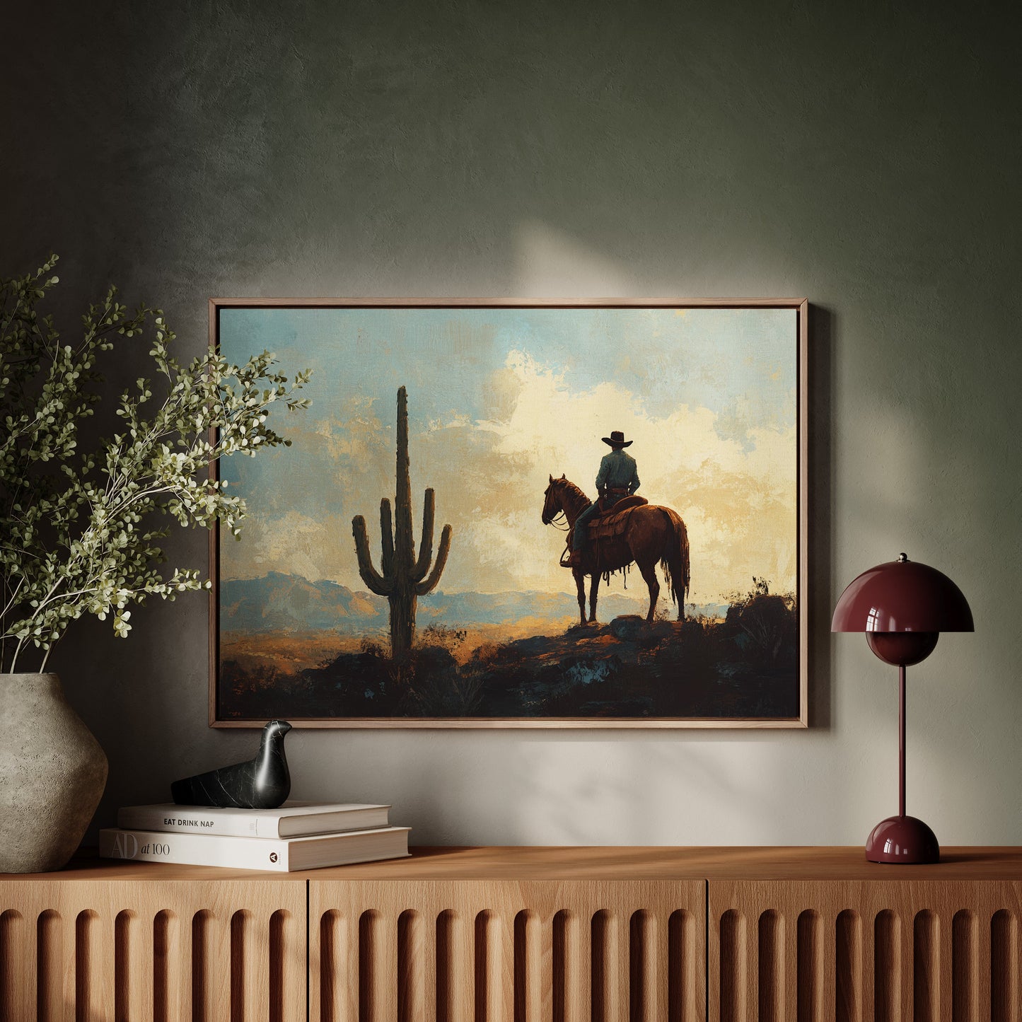 Cowboy-Sonnenuntergang bei den Saguaros