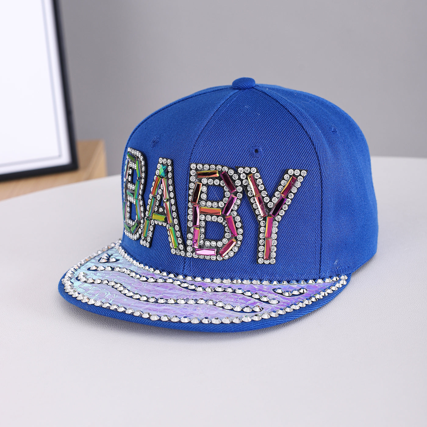 Men's And Women's Identical Colorful Diamond BABY Letter Hot Stamping Diamond Brim Hat. This Stylish Hip-hop Style Flat Brim Hat Is Suitable For Personalized Streetwear Outfits.