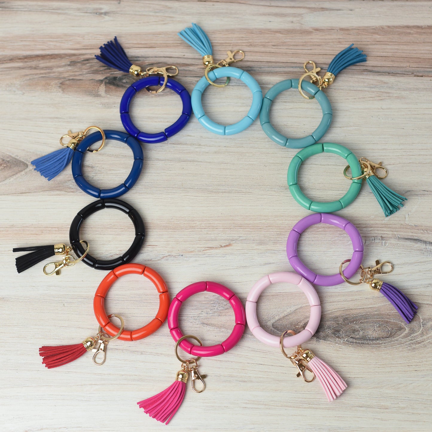 Bracelet extensible Katie Tube Bead avec pompon et porte-clés
