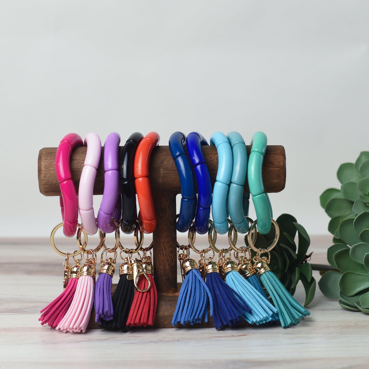Bracelet extensible Katie Tube Bead avec pompon et porte-clés