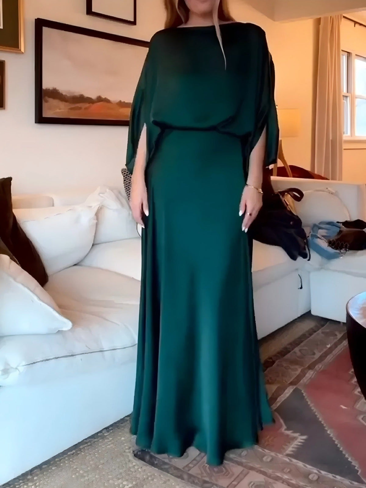 A Sleek Solid-color Satin Dress With Smooth Lines