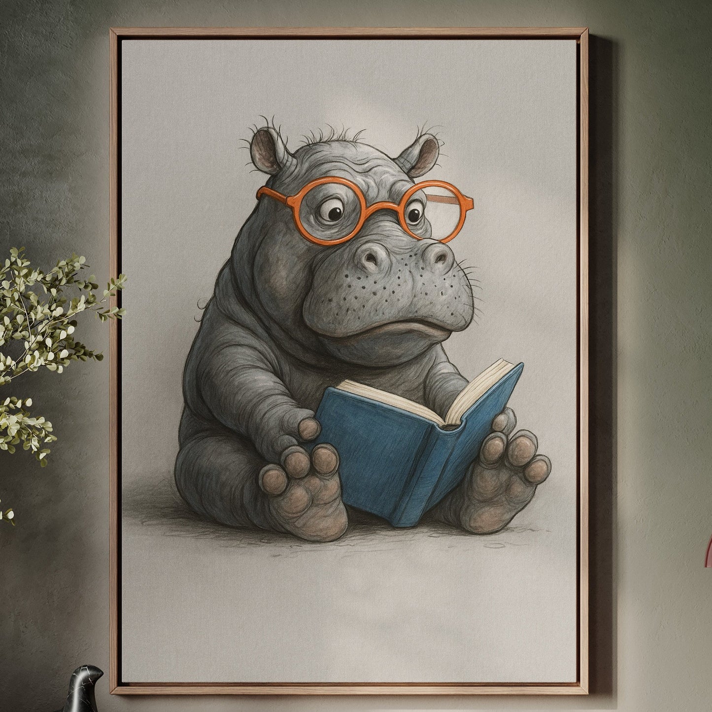 Baby-Nilpferd liest mit Brille
