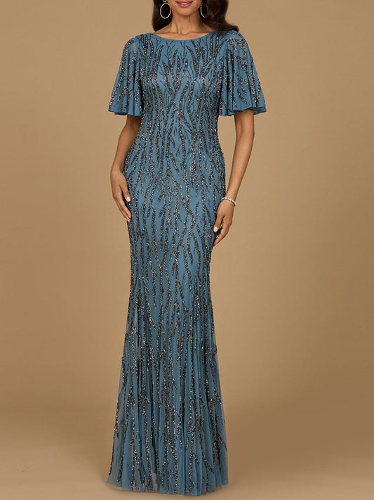 Perlenkleid mit bauschigen Ärmeln