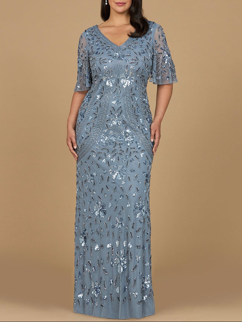 Robe longue perlée à col en V et manches cape
