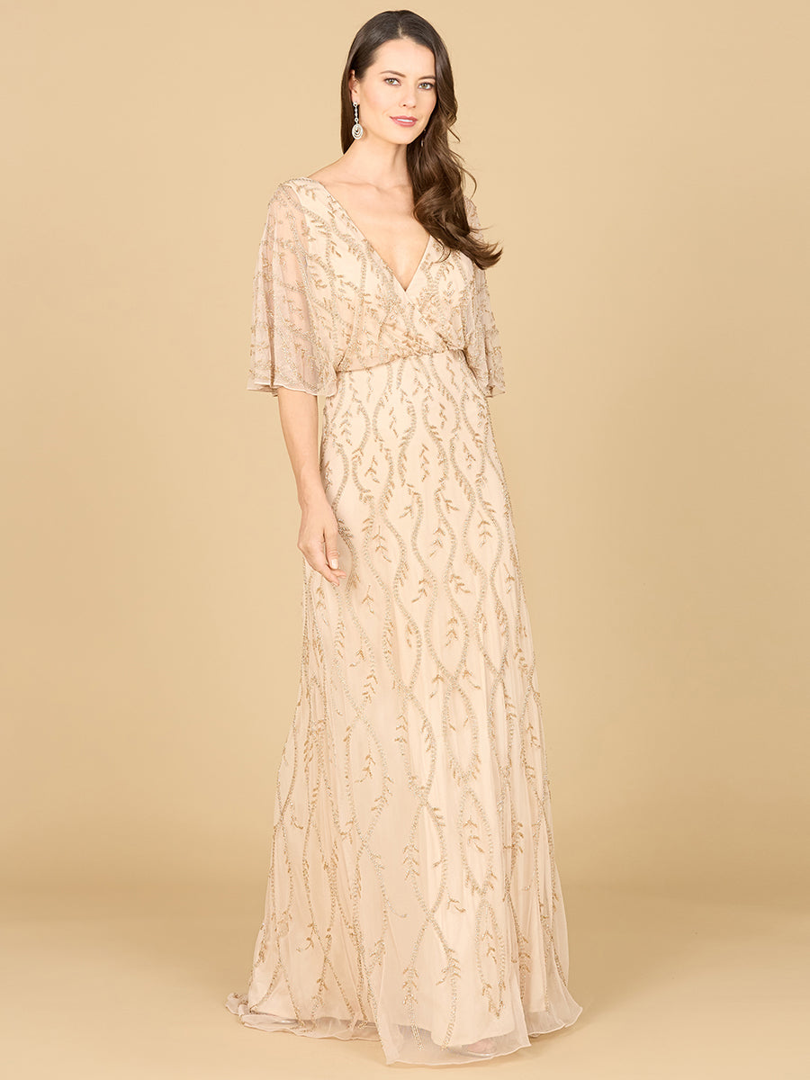Abendkleid mit Perlenstickerei und Cape-Ärmeln aus Illusionstüll
