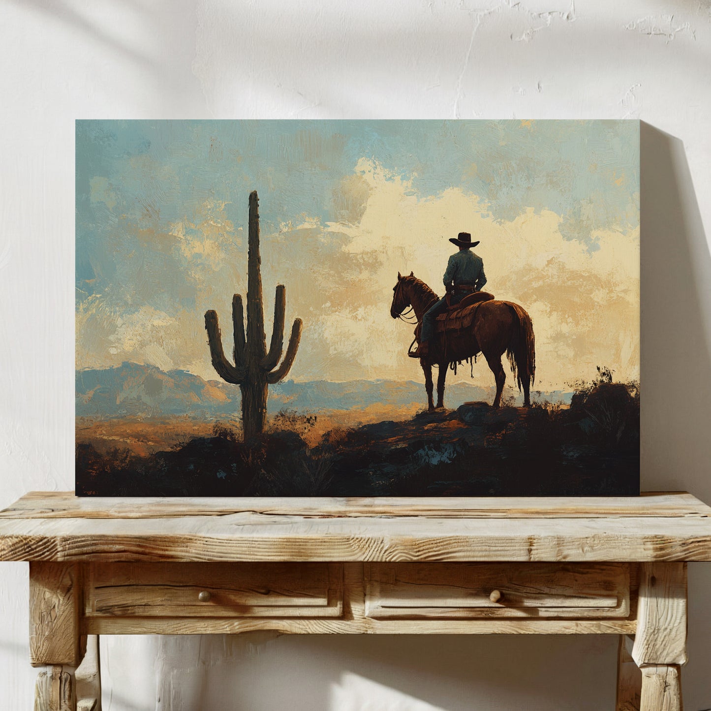 Cowboy-Sonnenuntergang bei den Saguaros