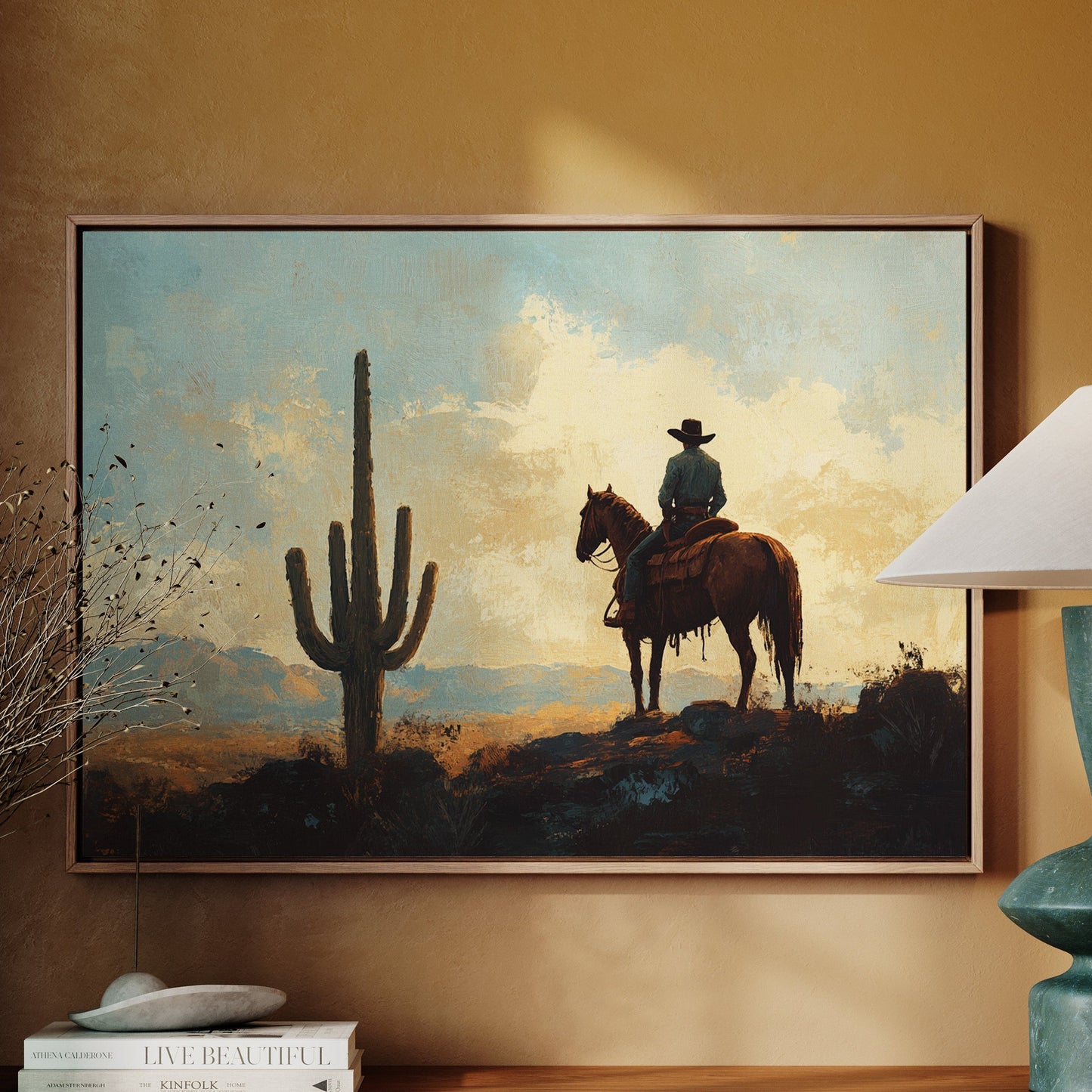 Cowboy-Sonnenuntergang bei den Saguaros