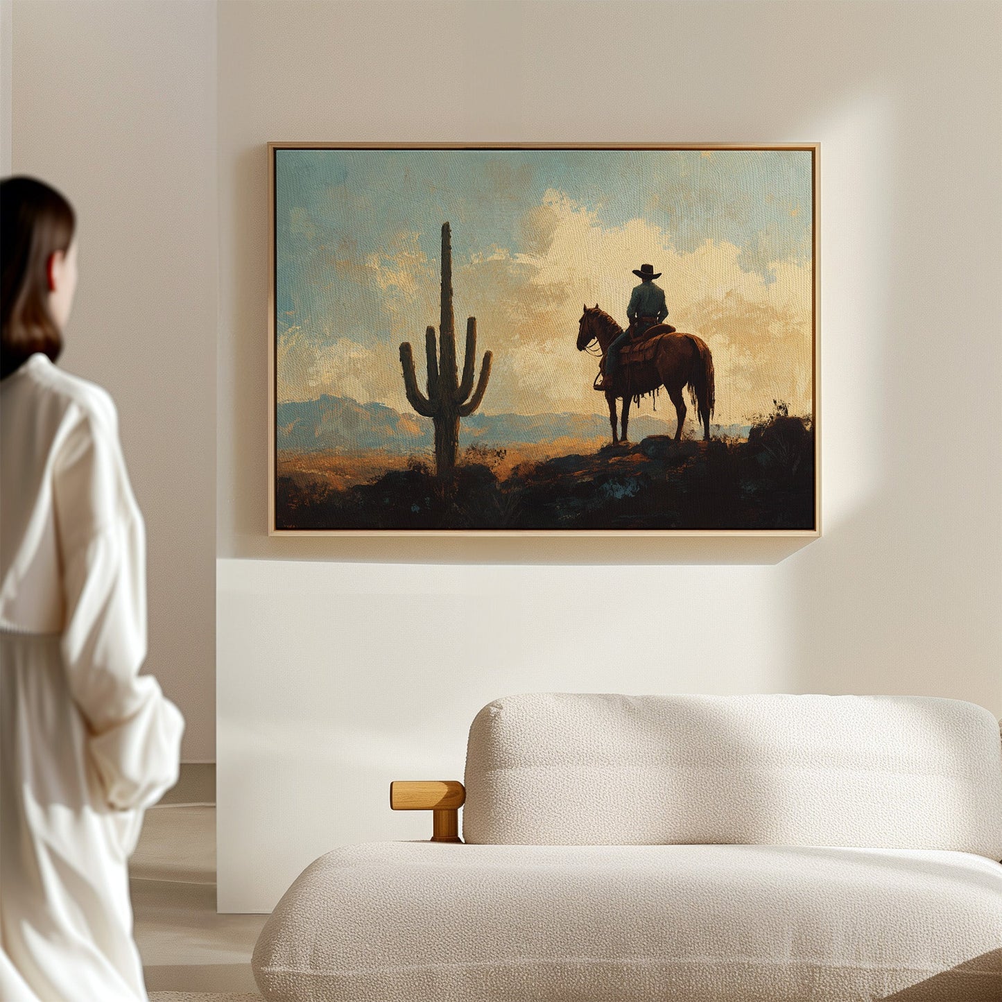 Cowboy-Sonnenuntergang bei den Saguaros