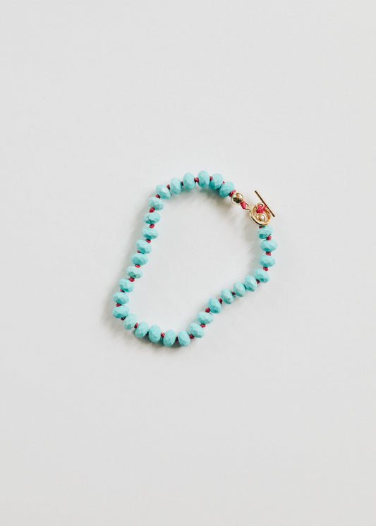 Bracelet ou chevilletière en turquoise et fermoir à bascule en or 14 carats