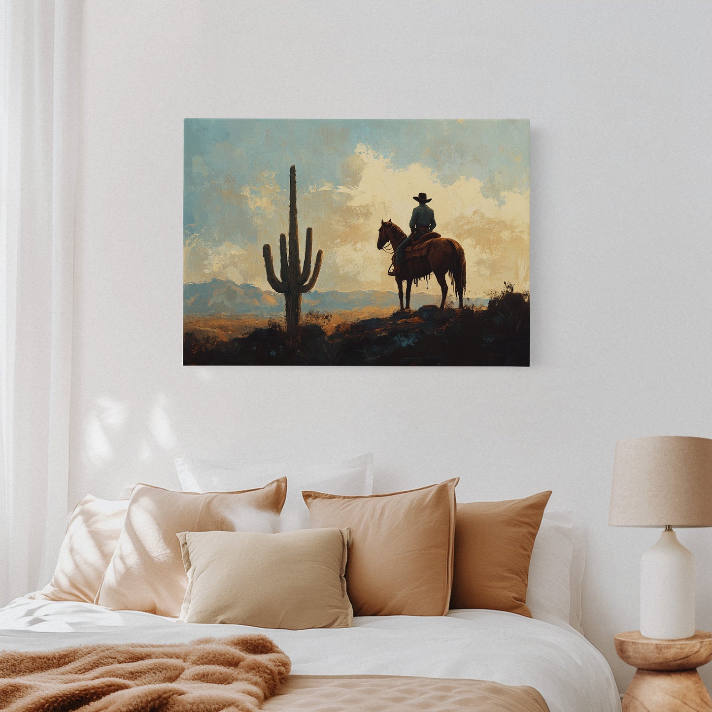 Cowboy-Sonnenuntergang bei den Saguaros