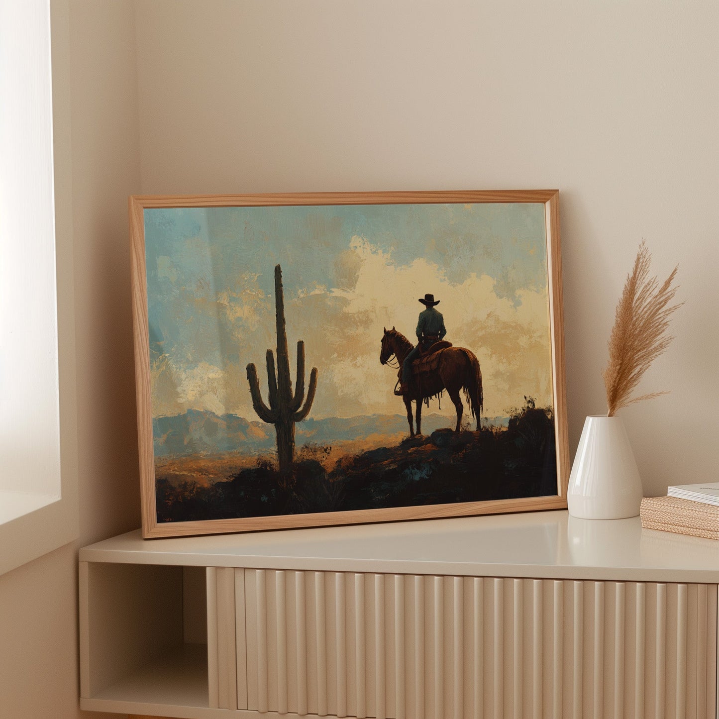 Cowboy-Sonnenuntergang bei den Saguaros