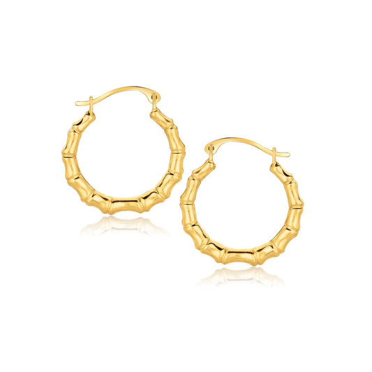 Boucles d'oreilles créoles en or jaune 10 carats motif branche