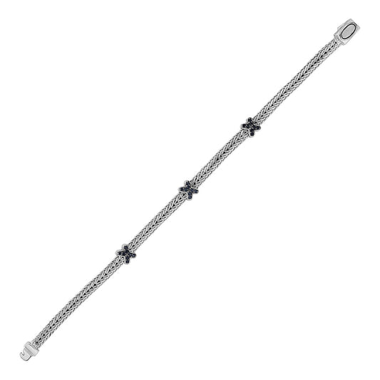 Geflochtenes Seilarmband mit schwarzen Saphir-X-Akzenten in Sterlingsilber