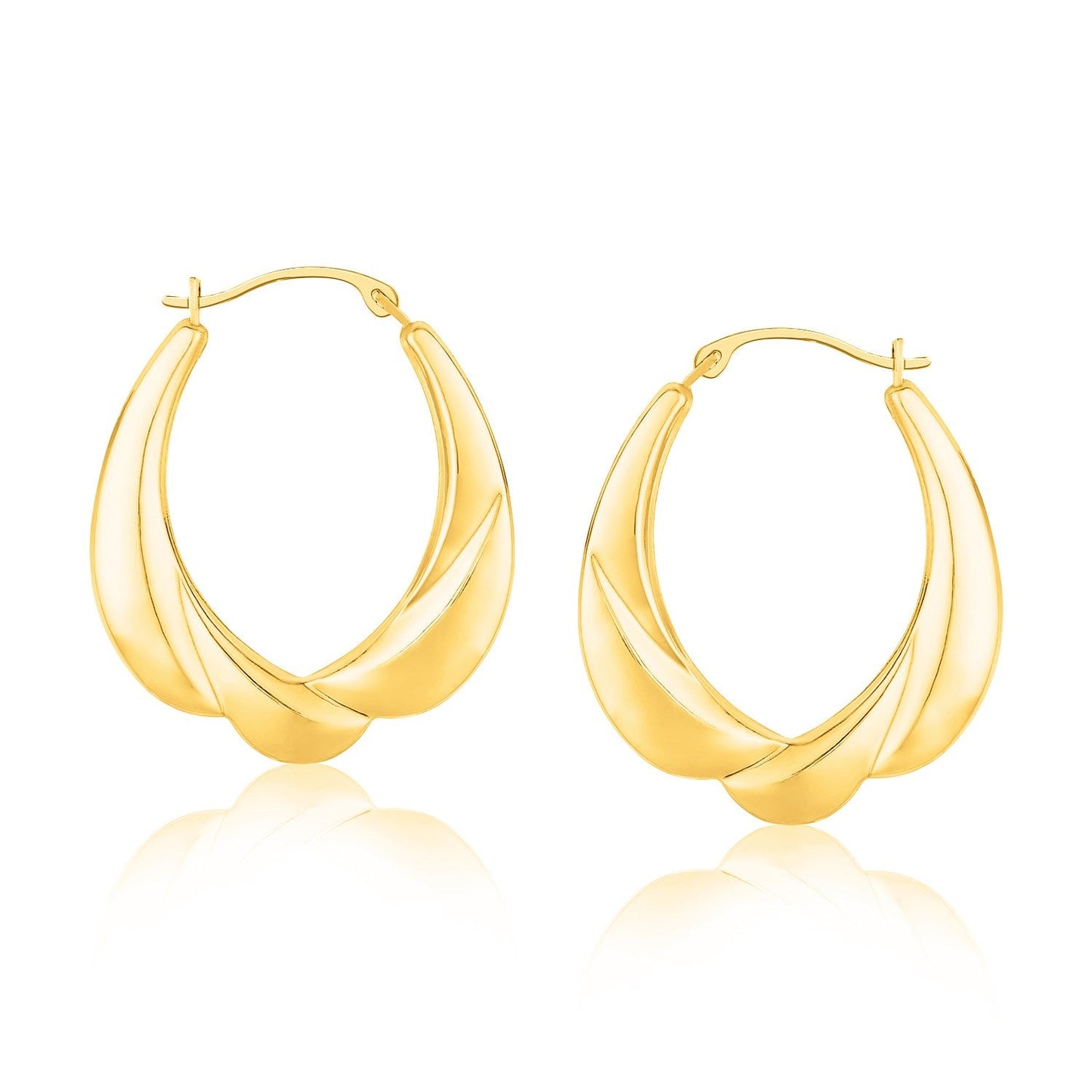 Boucles d'oreilles créoles ovales dégradées motif coquillage en or jaune 14 carats