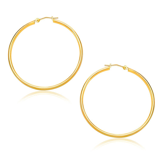 Boucles d'oreilles créoles polies en or jaune 10 carats (1,5x30 mm)