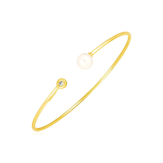 Armspange aus 14 Karat Gelbgold mit Perle und Diamant