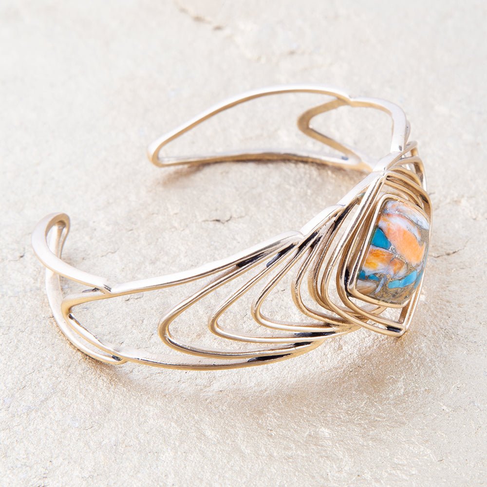 Bracelet manchette doré flèches turquoise et orange avec incrustation de spondyle