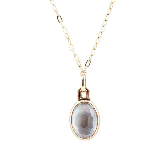 Collier pendentif doré en nacre noire