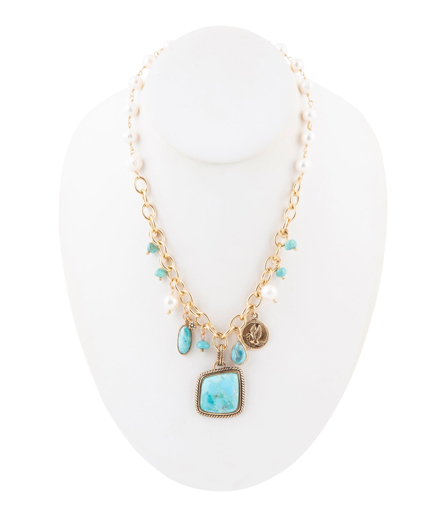 Goldkette mit mehreren Anhängern aus blauem Türkis und weißen Perlen