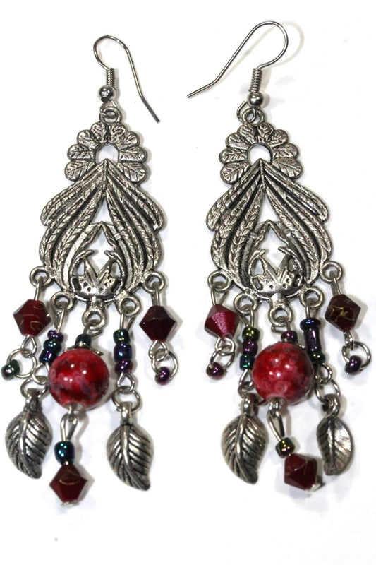 Boucles d'oreilles pendantes bohèmes en perles marbrées avec breloques feuilles