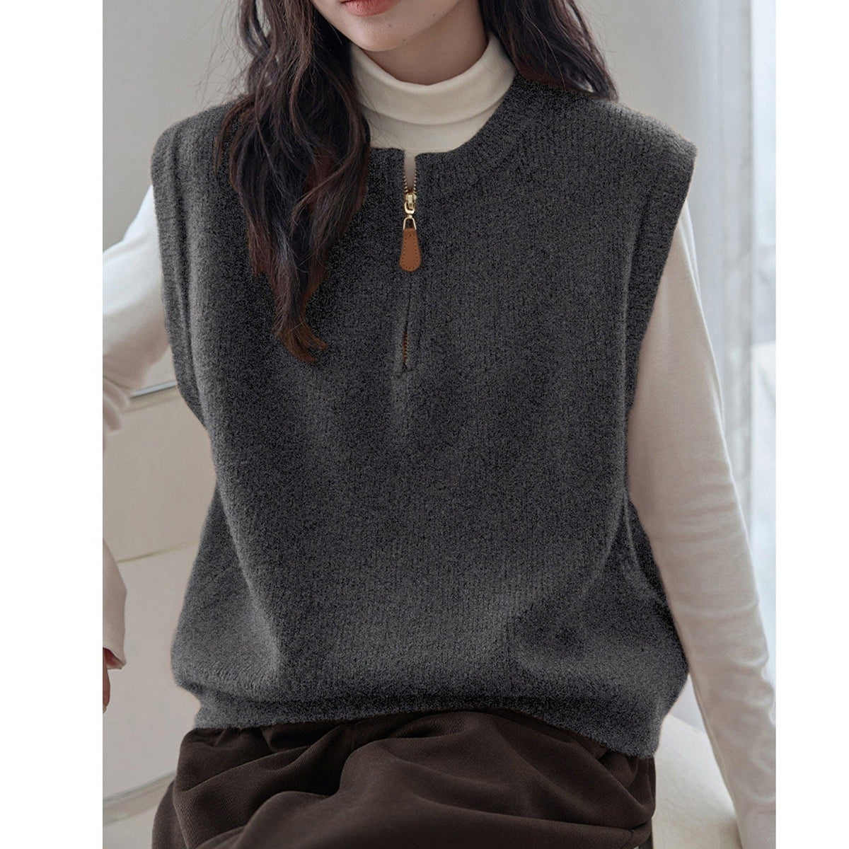 Dark Gray Crew-neck Half-zip Knit Vest Layered Over A Gray College-style Sweater Vest