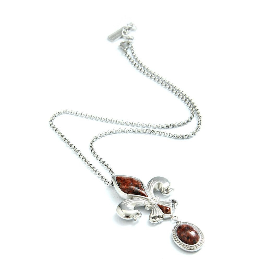 Collier pendentif fleur de lumière en pierre rouge plaqué argent