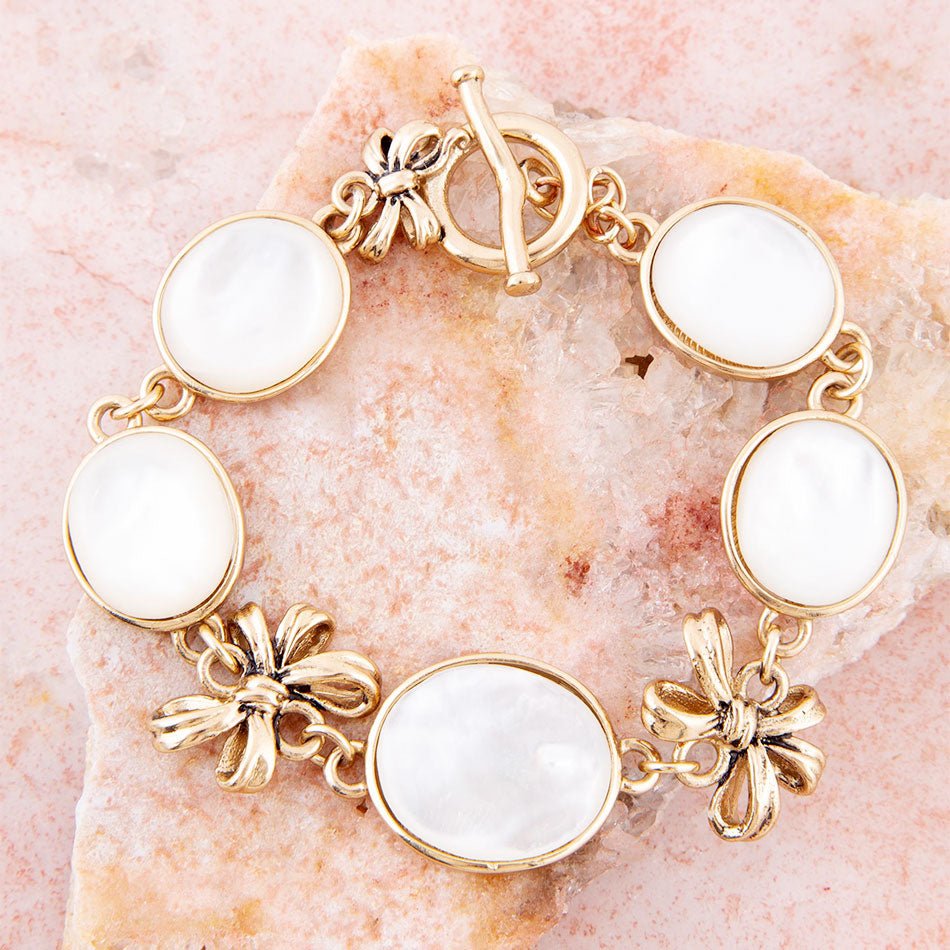 Geschenkte weiße Perlmutt Gold Schleifen Gliederarmband