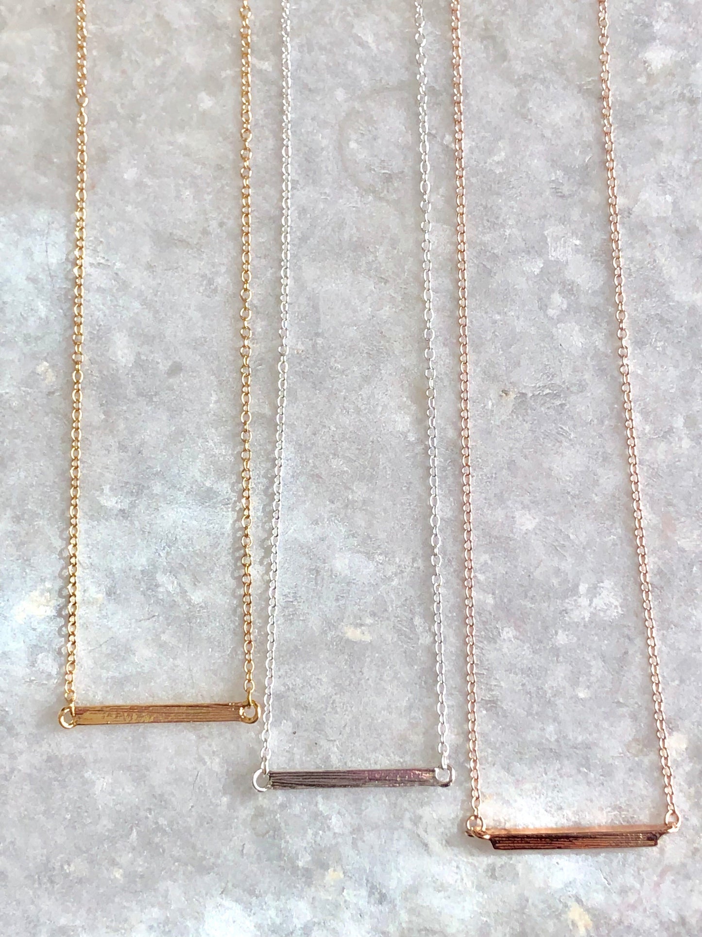 Collier pendentif barre Latitude