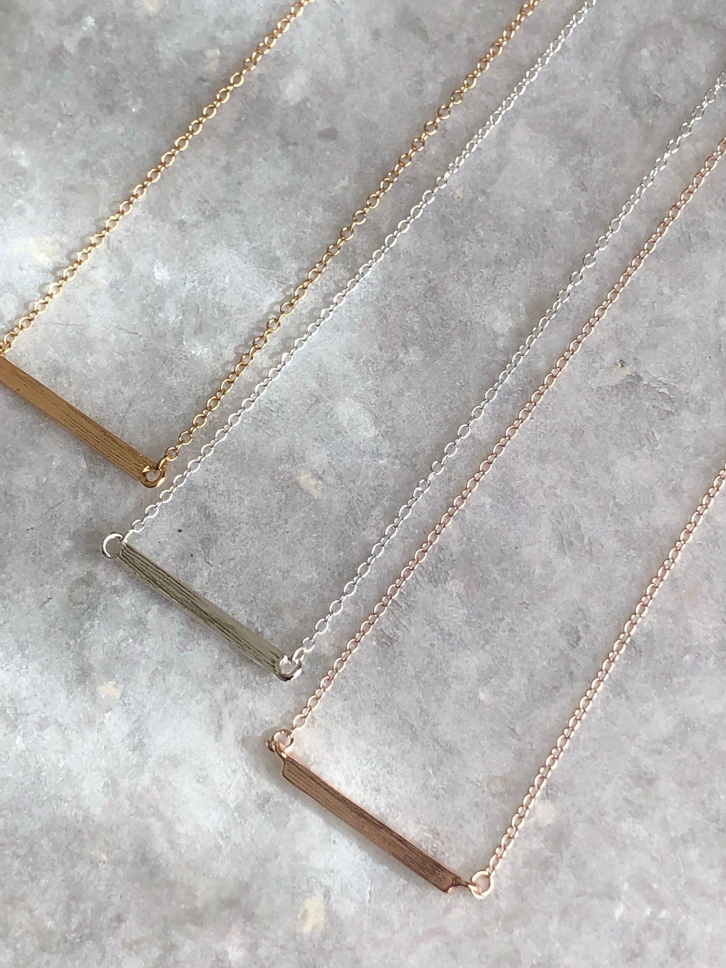 Collier pendentif barre Latitude