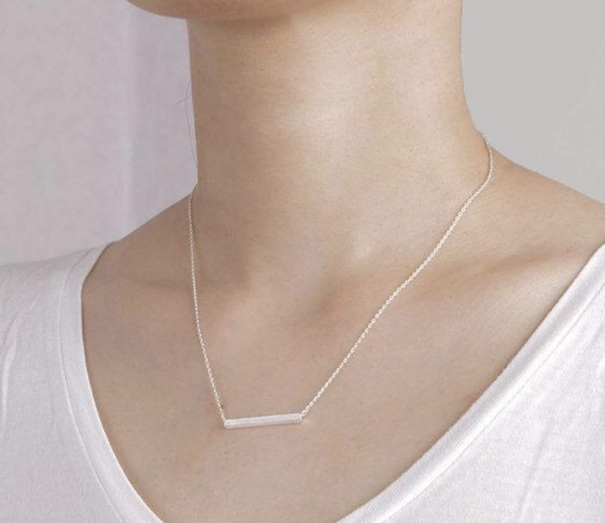 Collier pendentif barre Latitude