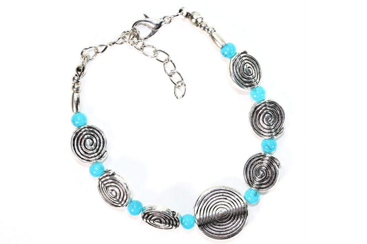 Bracelet à breloques spirale infini avec boucles d'oreilles papillon dorées