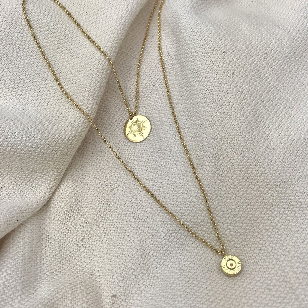 Collier superposé avec pendentif étoile du Nord en obus recyclé plaqué or