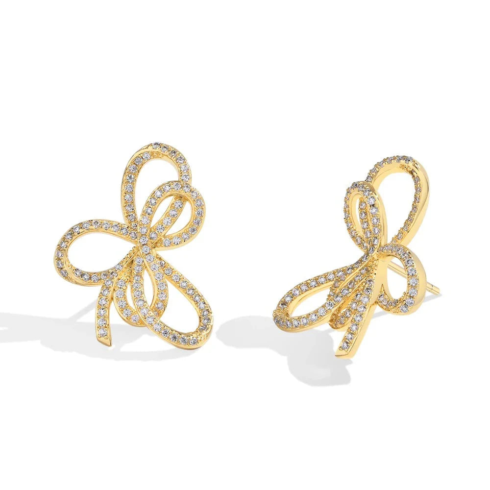 Boucles d'oreilles clous en moissanite avec nœud papillon en argent sterling 925 étincelant pour fiançailles