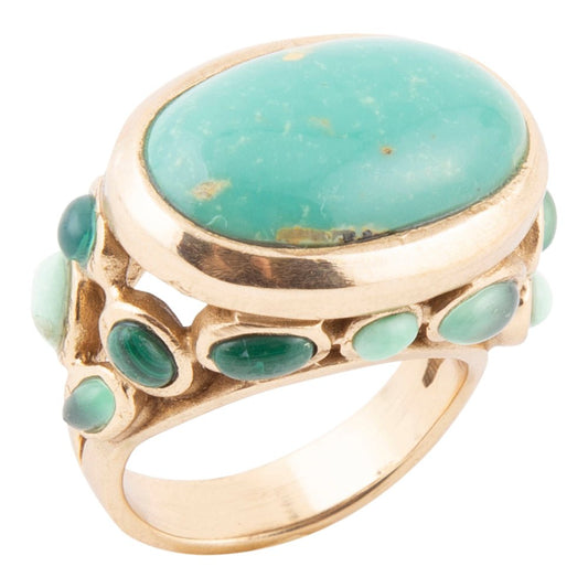 Bague Dorée Ornée de Plusieurs Pierres Vertes