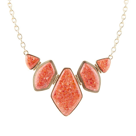 Collier en or avec pendentif corail éponge orange formes multiples