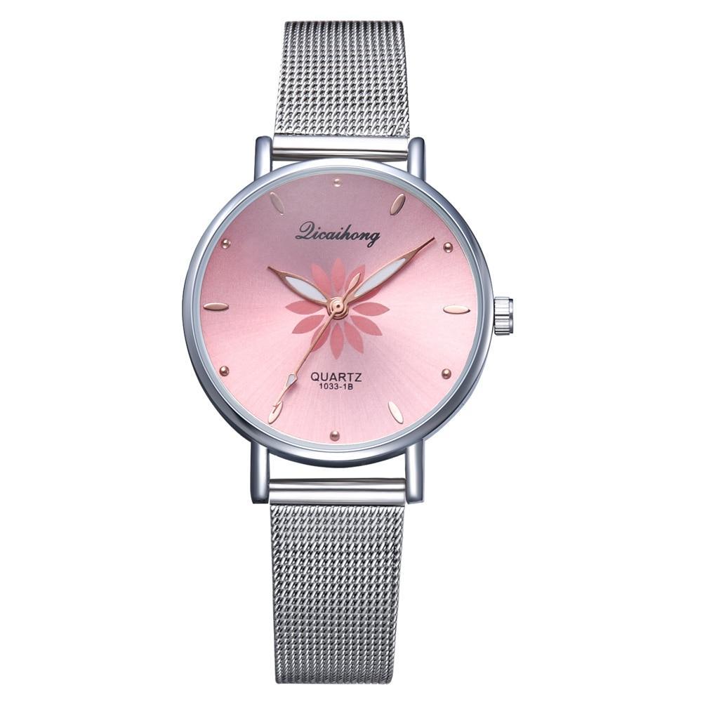 Women's Stylish Elegant Watch With Braided Steel Bracelet With Shiny Background Unique Design Perfect Gif